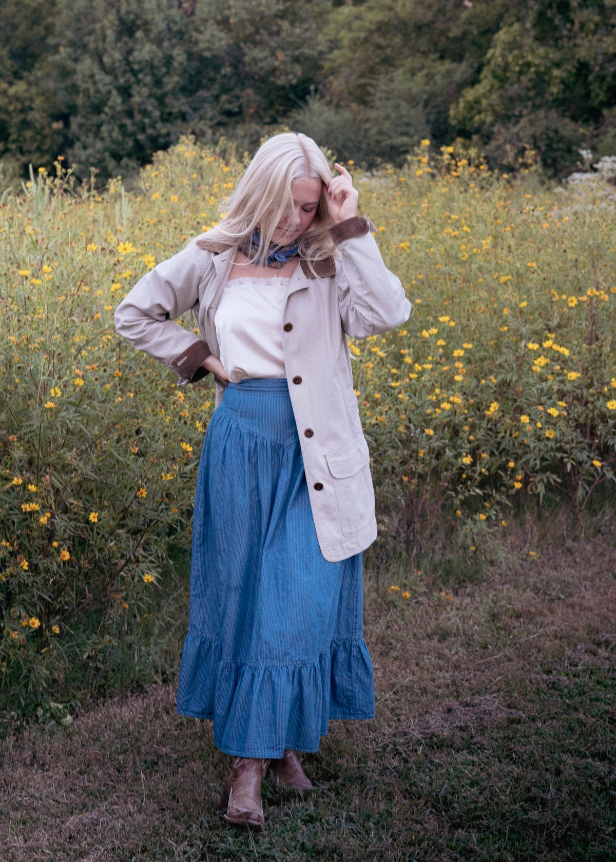 Demelza Skirt styled with an ivory camisole, a cream jacket, and brown boots